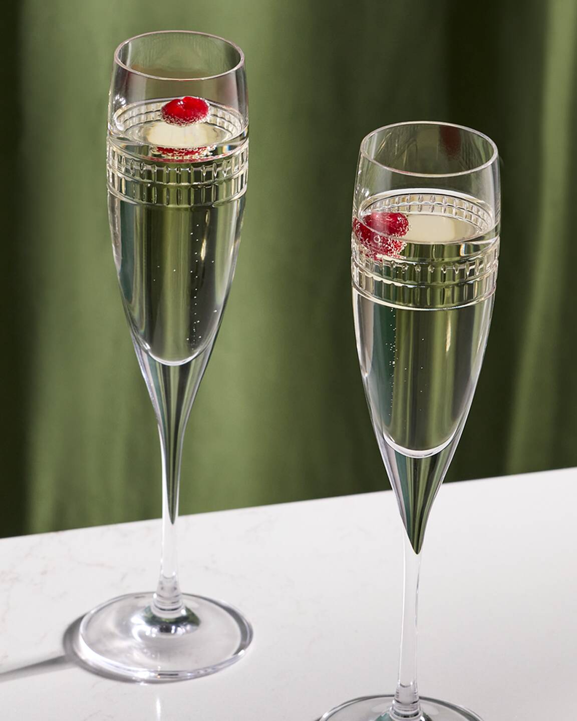 Kinship Radiant Flutes filled with bubbly drink